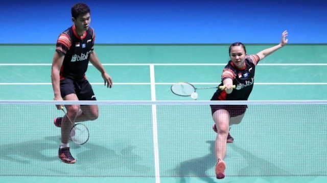 Pasangan ganda campuran Indonesia, Praveen Jordan/Melati Daeva Oktavianti, memenangi babak kedua Japan Open 2019 dengan mengalahkan Chang Tak Ching/Ng Wing Yung (Hong Kong) di Musashino Forest Sport Plaza, Tokyo, Kamis (25/7). [Humas PBSI]