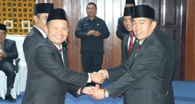 Edminudin dan Arpan Kamil